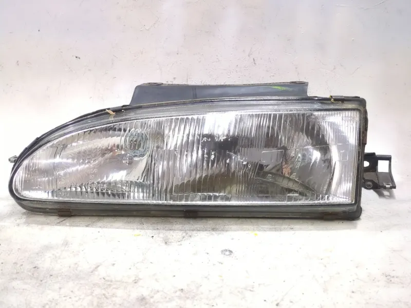Recambio de faro delantero izquierdo para hyundai s-coupe (sl)(1993) 1.5 i referencia OEM IAM 1011990  
