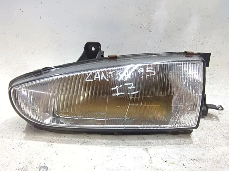 Recambio de faro delantero izquierdo para hyundai lantra (j1)(1992) 1.8 i.e. 16v referencia OEM IAM 1012492  