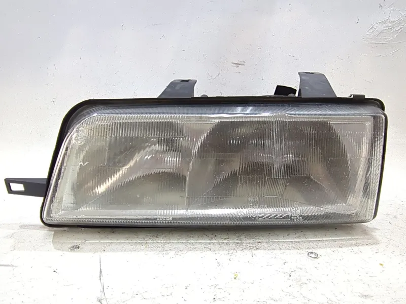 Recambio de faro delantero izquierdo para rover 800 fastback (xs) 820 sport referencia OEM IAM 54517790  