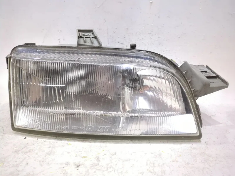Recambio de faro delantero derecho para fiat i punto (176) berlina (1993) 55 1.1 referencia OEM IAM R14295600  