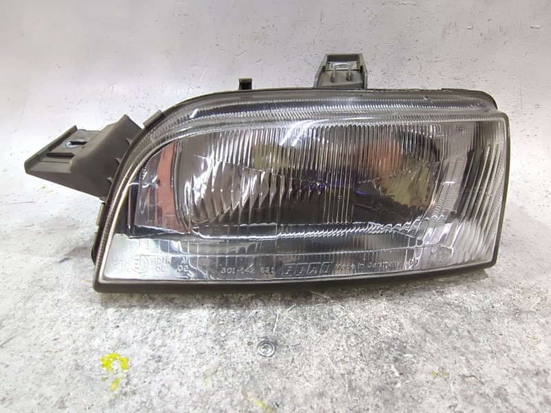 Recambio de faro delantero izquierdo para fiat punto (176_) 1.7 d referencia OEM IAM L14259700  