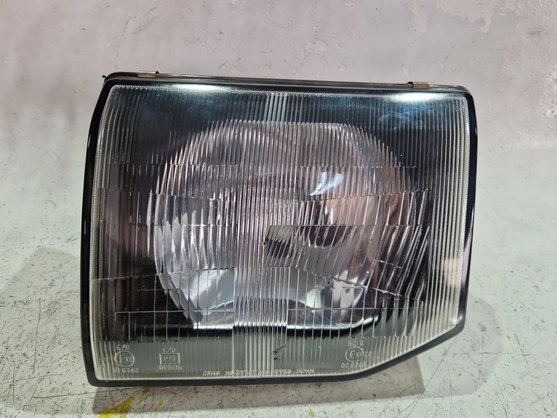 Recambio de faro delantero izquierdo para mitsubishi pajero 2.8 d 125cv referencia OEM IAM 11037747  