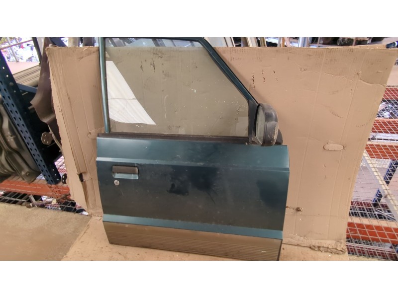 Recambio de puerta delantera derecha para ssangyong family 2.5 d 68cv referencia OEM IAM   